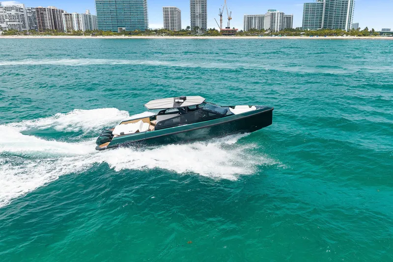 Slide: The Image of 2023 Wally wallytender43X yacht cruising on open sea near coastline. - 14