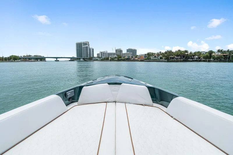 Slide: The Image of 2023 Wally wallytender43X on calm waters with city skyline view. - 18