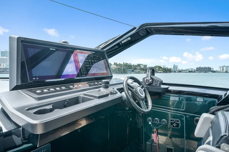 Slide: The Image of Cockpit of 2023 Wally wallytender43X with advanced navigation system. - 26