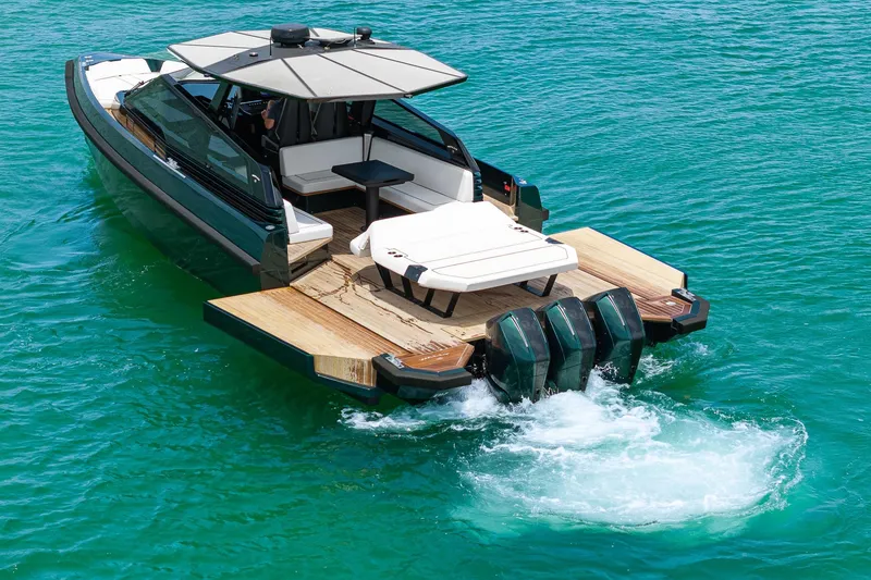 Slide: The Image of Luxurious Wally wallytender43X boat on turquoise water, 2023 model. - 4