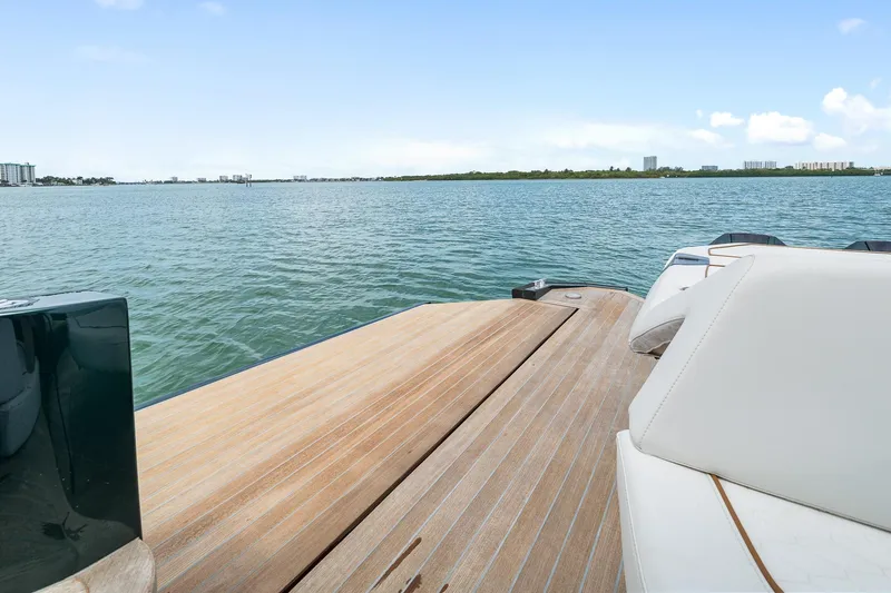 Slide: The Image of Wally wallytender43X 2023 on calm waters with wooden deck. - 46