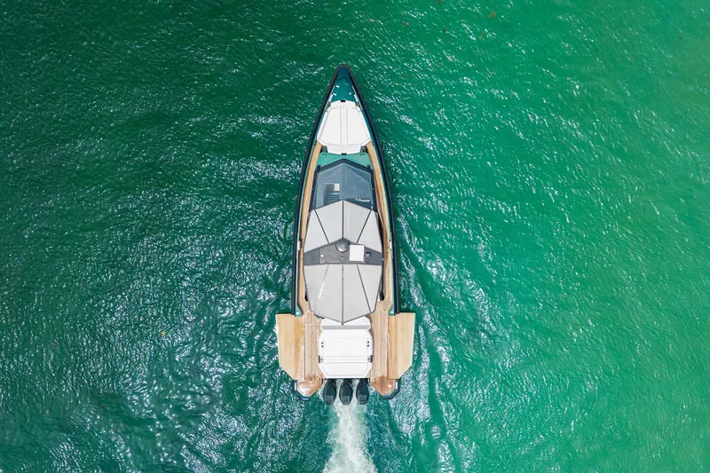 Slide: The Image of Aerial view of Wally wallytender43X yacht on turquoise water, 2023 model. - 6