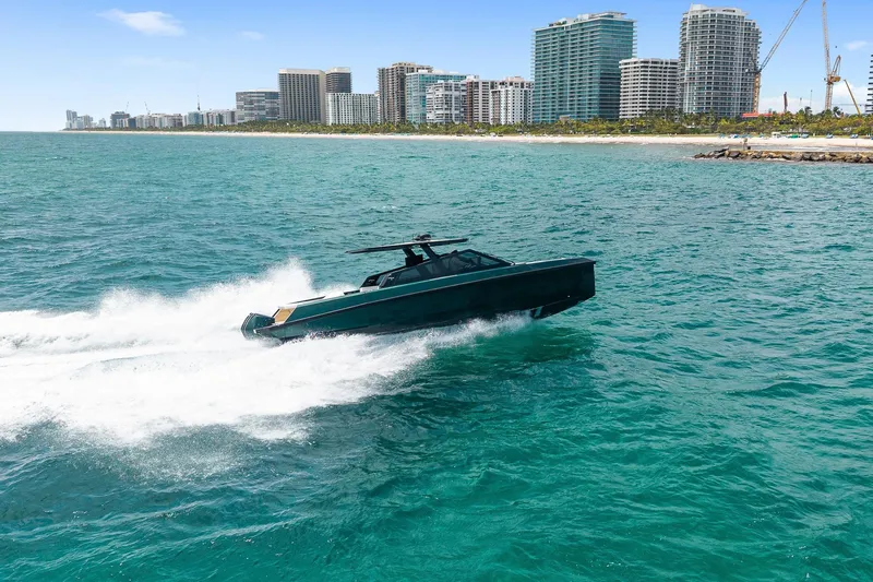Slide: The Image of 2023 Wally wallytender43X yacht cruising on the sea near coastline. - 7