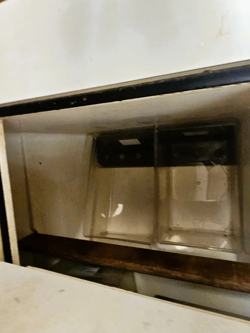 Slide: The Image of Interior of a 1985 Sabre 34 with storage space. - 14