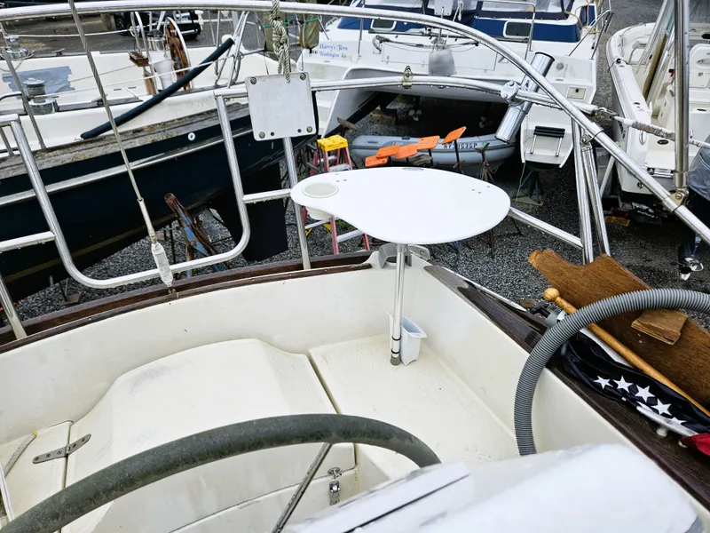 Slide: The Image of Cockpit of a 1985 Sabre 34 sailboat in harbor. - 5