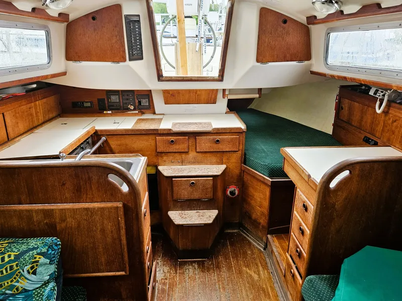 Slide: The Image of Interior of a 1985 Sabre 34 yacht with wooden furnishings. - 19
