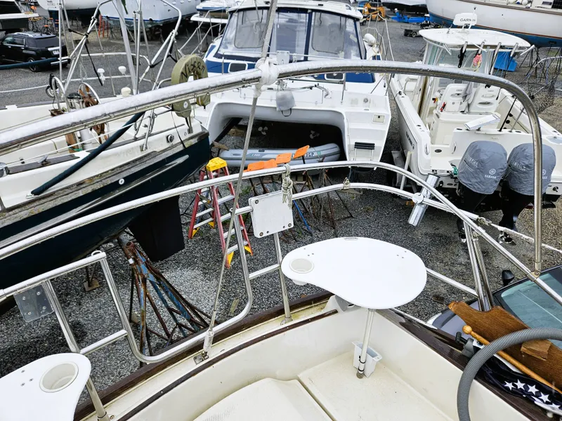 Slide: The Image of 1985 Sabre 34 sailboat in dry dock with other boats. - 6