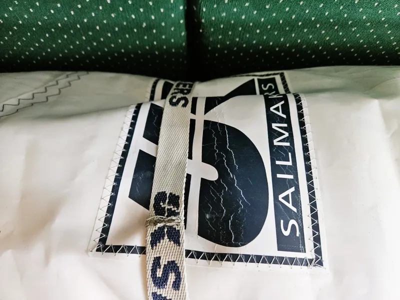 Slide: The Image of Close-up of sail with logo, Sabre 34, year 1985. - 10