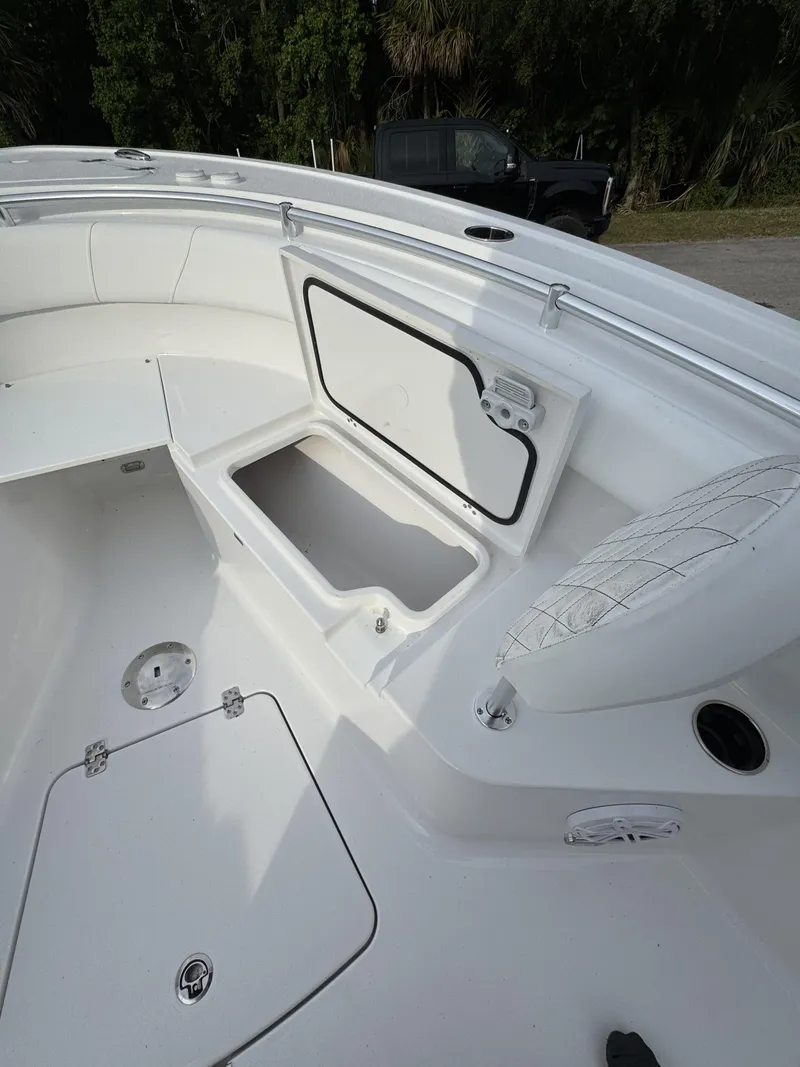 Slide: The Image of 2026 Sportsman Open 232 Center Console with open storage compartment. - 16