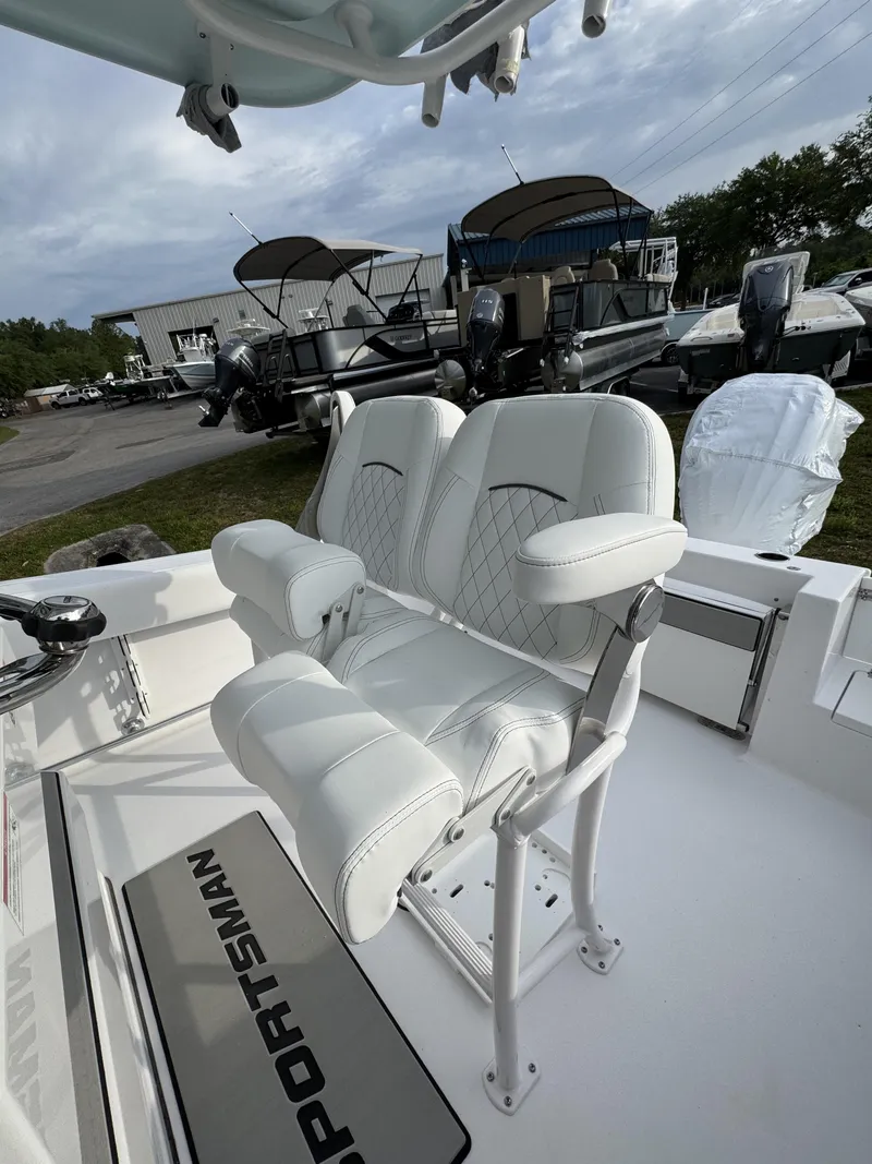 Slide: The Image of 2026 Sportsman Open 232 Center Console with luxurious white seating. - 19