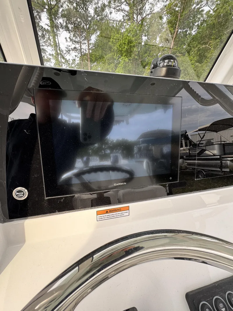 Slide: The Image of Garmin display on Sportsman Open 232 Center Console 2026. - 21