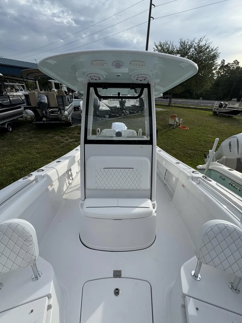 Slide: The Image of 2026 Sportsman Open 232 Center Console boat, interior view, white design. - 24