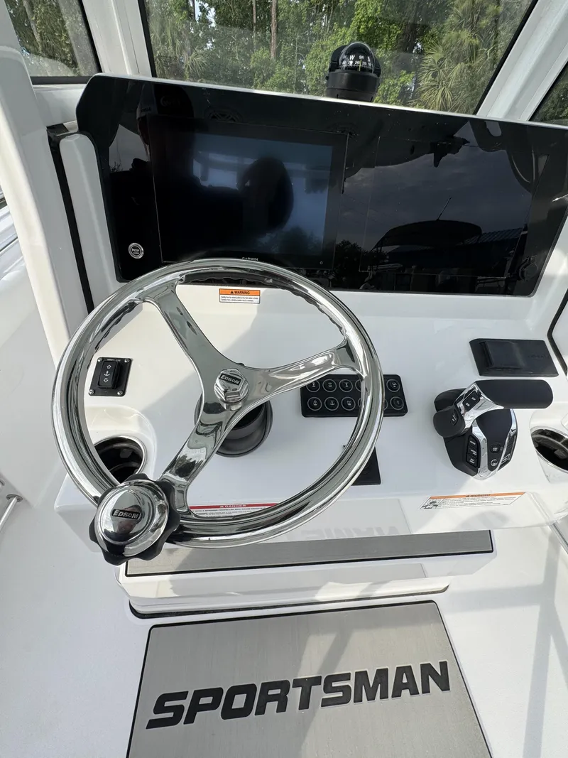 Slide: The Image of Steering console of the 2026 Sportsman Open 232 Center Console. - 25