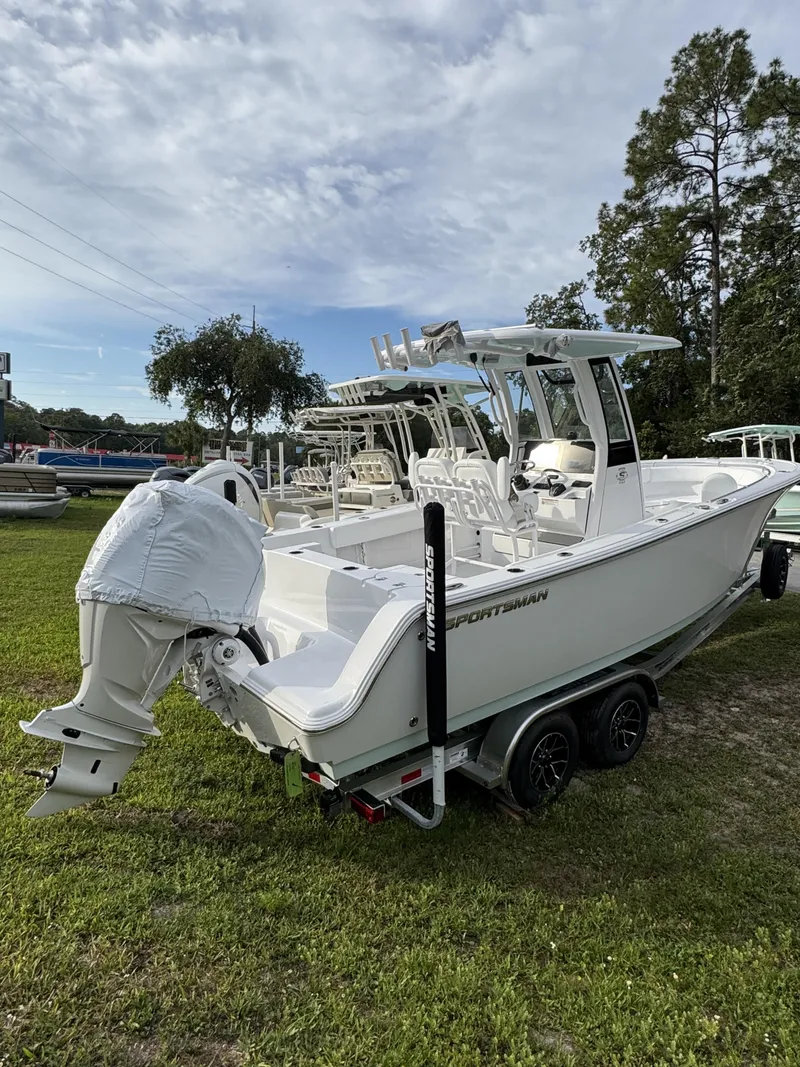 Slide: The Image of 2026 Sportsman Open 232 Center Console on trailer outdoors. - 5