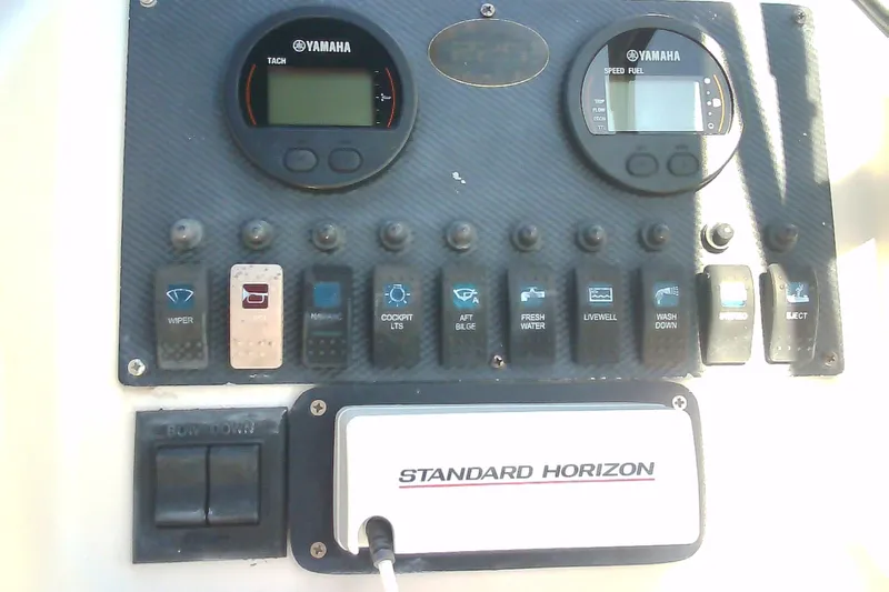 Slide: The Image of Control panel of a 2005 Grady-White Tournament 225 boat with Yamaha gauges. - 17