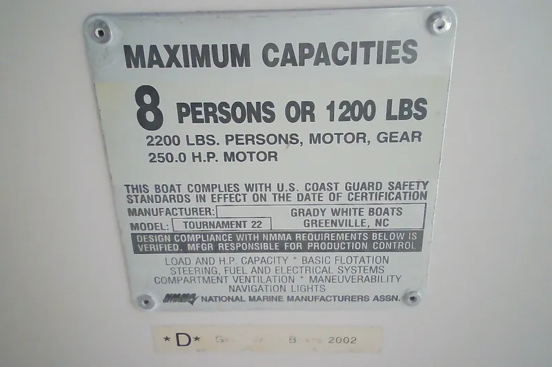 Slide: The Image of Grady-White Tournament 225, 2005 boat capacity plate, 8 persons or 1200 lbs, 250 HP motor. - 18