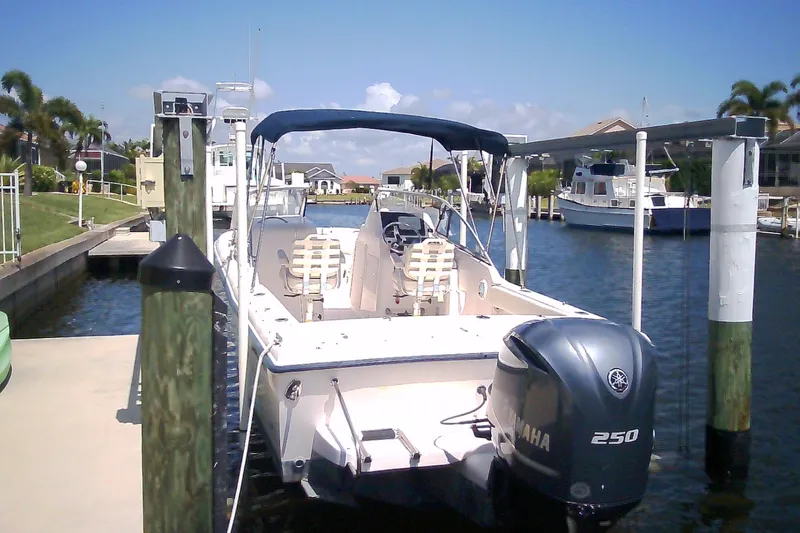 Slide: The Image of 2005 Grady-White Tournament 225 boat docked with Yamaha 250 engine. - 32
