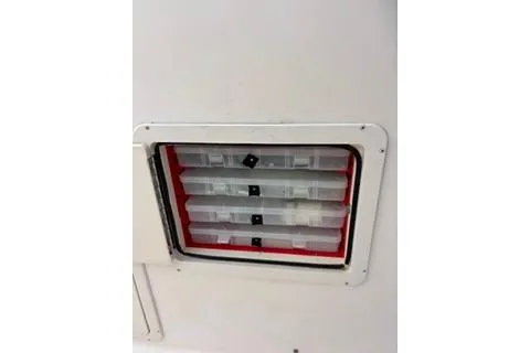Slide: The Image of Ventilation panel on a 2005 Grady-White Tournament 225 boat. - 5