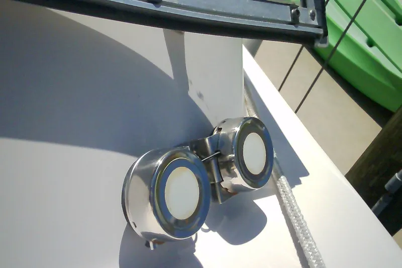 Slide: The Image of Close-up of a 2005 Grady-White Tournament 225 boat's stainless steel deck hardware. - 6