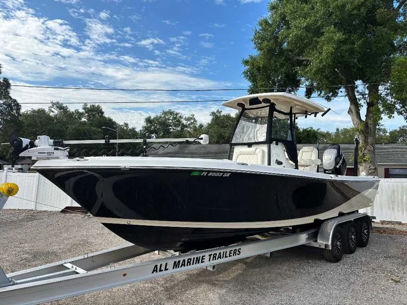 The Image of 2021 Blue Wave 2800 Makaira boat on trailer, side view. - 0