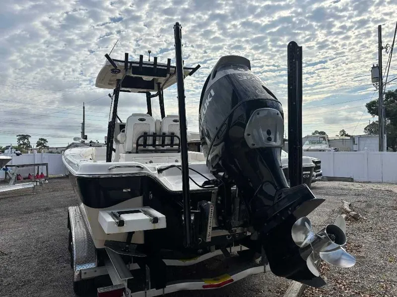 Slide: The Image of 2021 Blue Wave 2800 Makaira boat with outboard motor. - 12