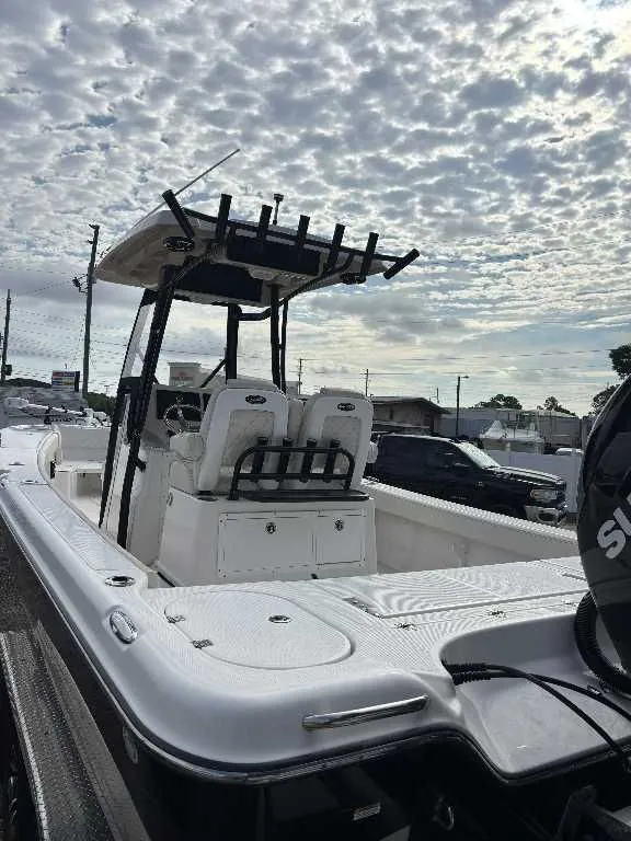 Slide: The Image of 2021 Blue Wave 2800 Makaira boat under cloudy sky. - 14