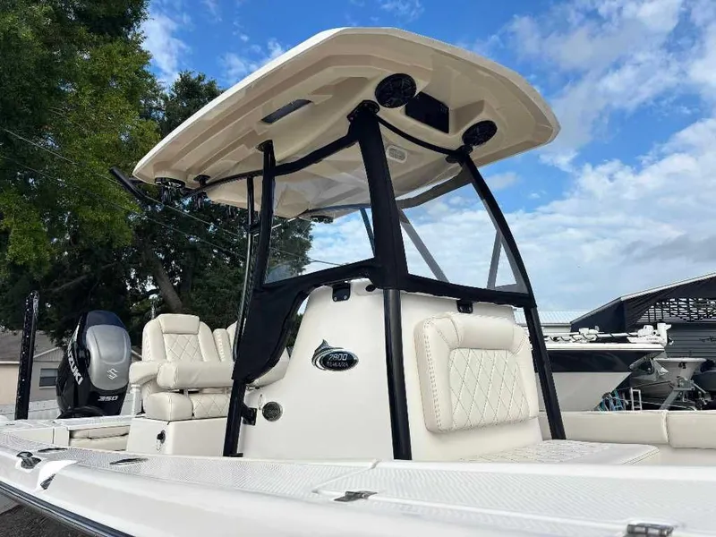 Slide: The Image of 2021 Blue Wave 2800 Makaira boat with T-top and Suzuki engine. - 22