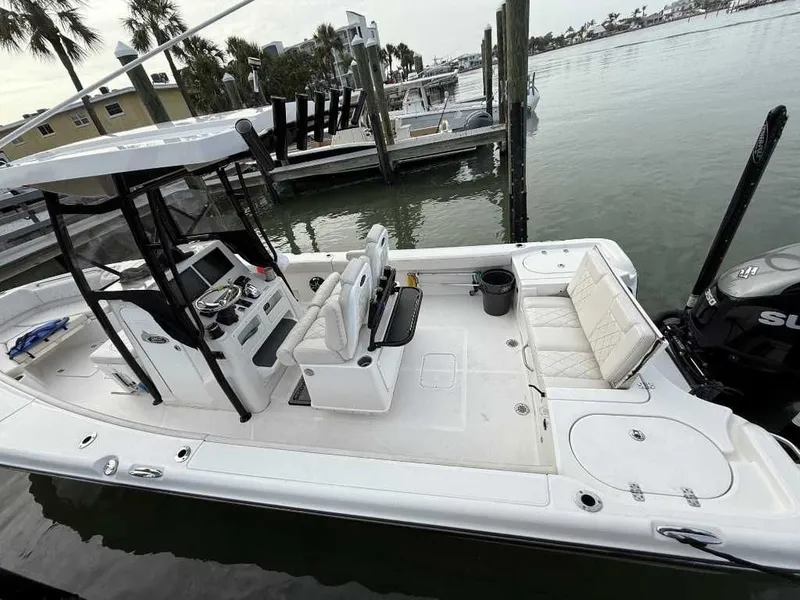 Slide: The Image of 2021 Blue Wave 2800 Makaira boat at dock, interior view. - 3
