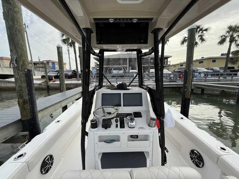 Slide: The Image of Interior view of 2021 Blue Wave 2800 Makaira boat at dock. - 4