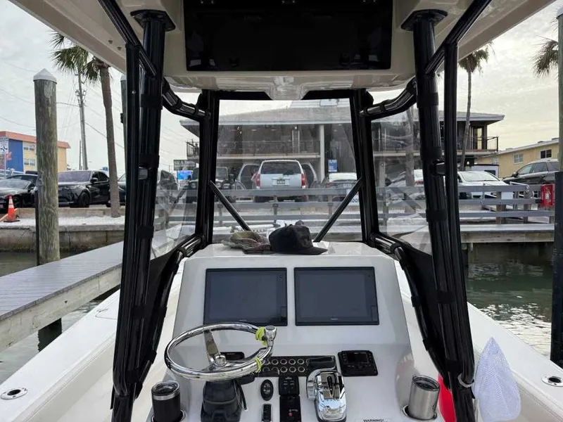 Slide: The Image of Interior view of 2021 Blue Wave 2800 Makaira boat at dock. - 5