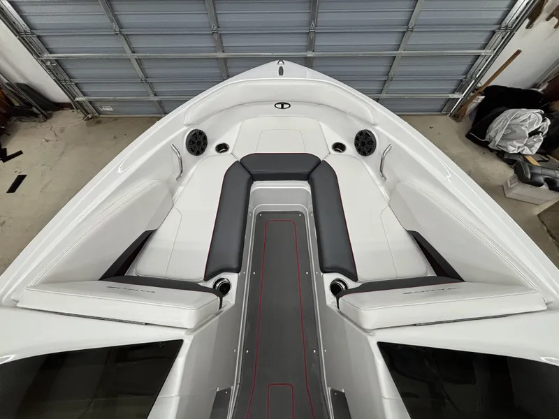 Slide: The Image of Interior of 2026 Tahoe S 210 S boat with gray and white seating. - 19