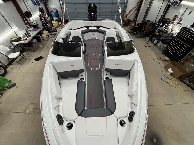 Slide: The Image of Interior view of 2026 Tahoe S 210 S boat in a workshop. - 20