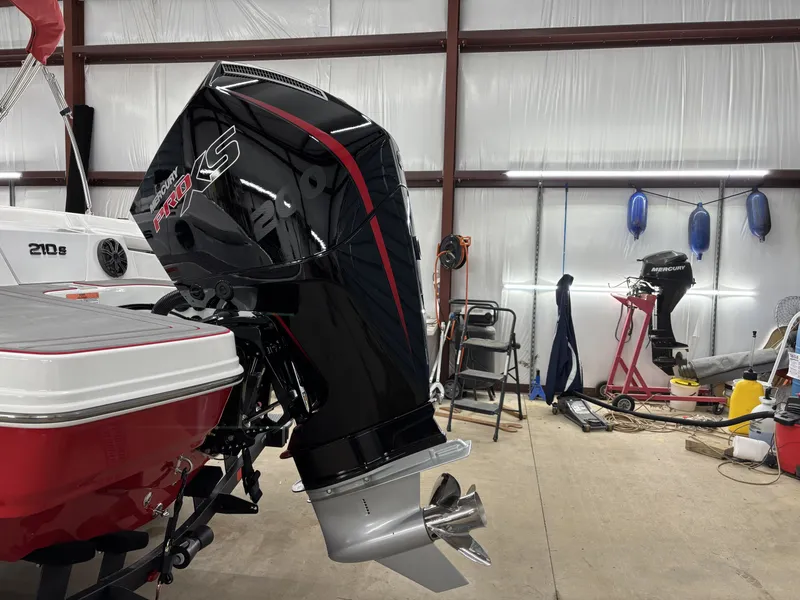 Slide: The Image of 2026 Tahoe S 210 S boat with Mercury Pro XS engine. - 8