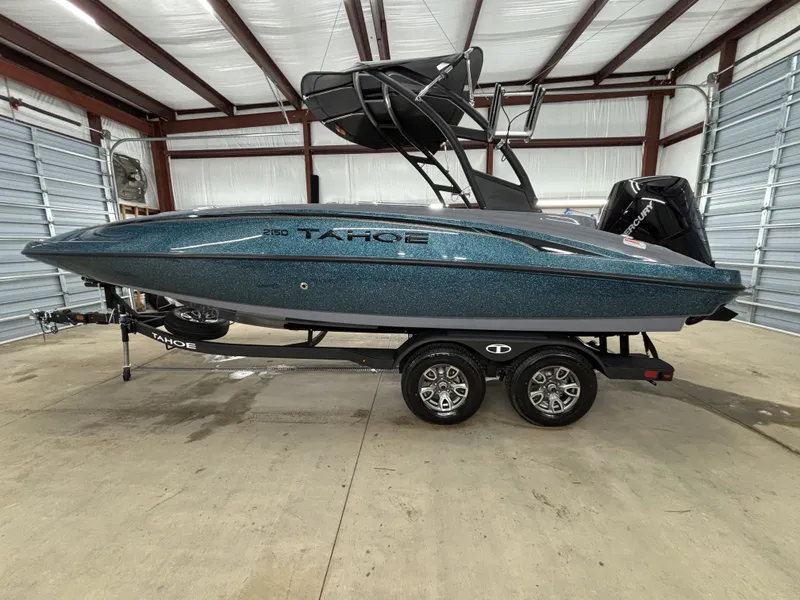 The Image of 2026 Tahoe Deck 2150 boat in warehouse. - 1