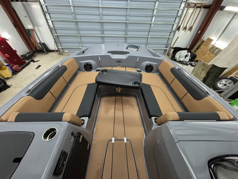 Slide: The Image of Interior of 2026 Tahoe Deck 2150 boat with seating area. - 11