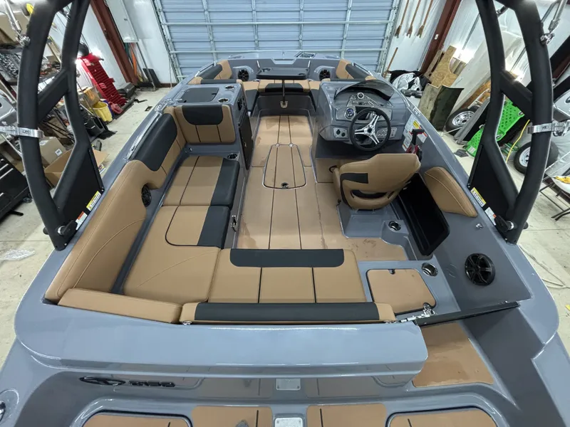 Slide: The Image of Interior of 2026 Tahoe Deck 2150 boat with seating and helm console. - 16