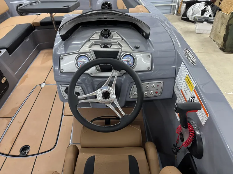 Slide: The Image of Interior view of 2026 Tahoe Deck 2150 boat cockpit. - 5