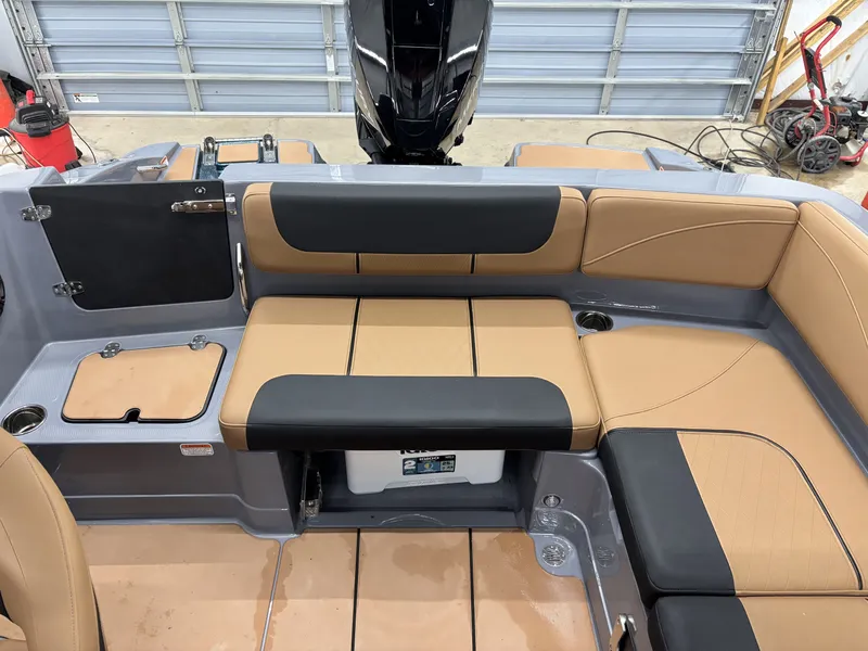Slide: The Image of 2026 Tahoe Deck 2150 interior with beige and black seating. - 7