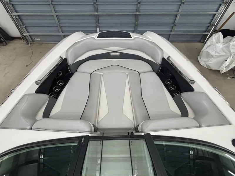 Slide: The Image of Interior of a 2013 Supra Launch SA350 boat, gray upholstery. - 15