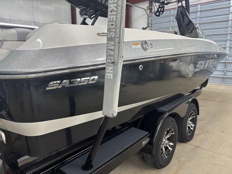 Slide: The Image of 2013 Supra Launch SA350 boat in warehouse. - 6
