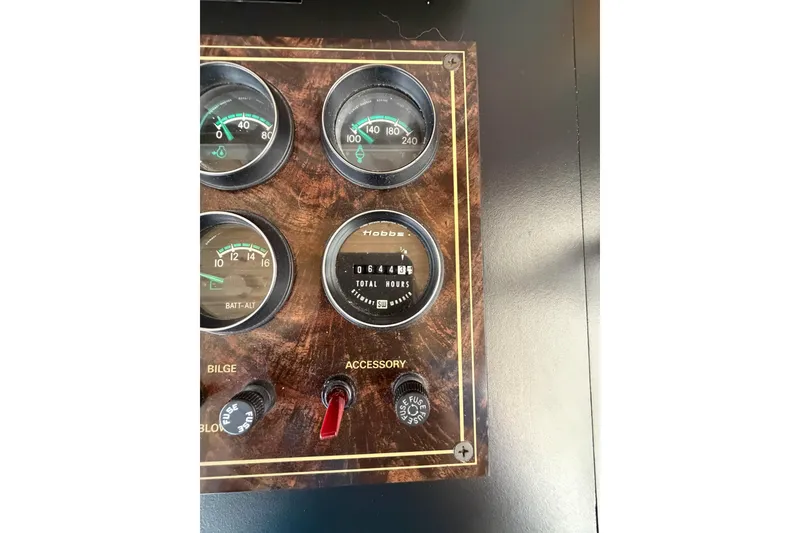 Slide: The Image of Control panel of a 1988 STARDUST 16x70 with gauges and hour meter. - 10