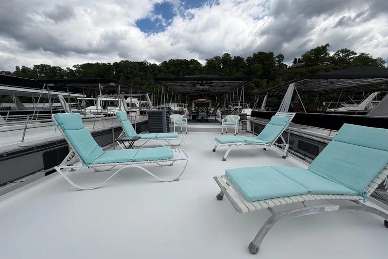 Slide: The Image of Rooftop deck of 1988 STARDUST 16x70 houseboat with lounge chairs and scenic view. - 48
