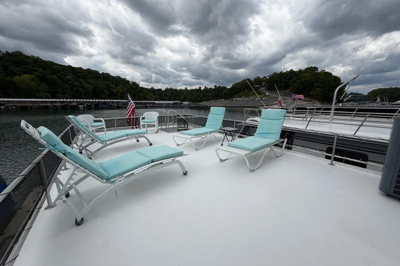 Slide: The Image of Rooftop deck of 1988 STARDUST 16x70 houseboat with lounge chairs and scenic lake view. - 50