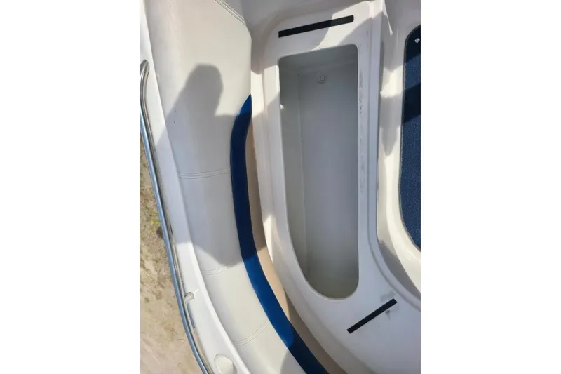 Slide: The Image of 2006 Hurricane FunDeck GS 232 IO boat interior storage compartment. - 13