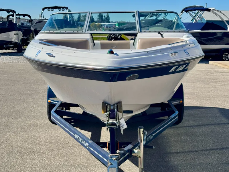 Slide: The Image of 2006 Four Winns 190 Horizon boat on trailer. - 9