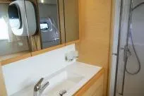 Slide: The Image of Modern bathroom interior of 2018 Lagoon 400 S2 yacht with sink and shower. - 33