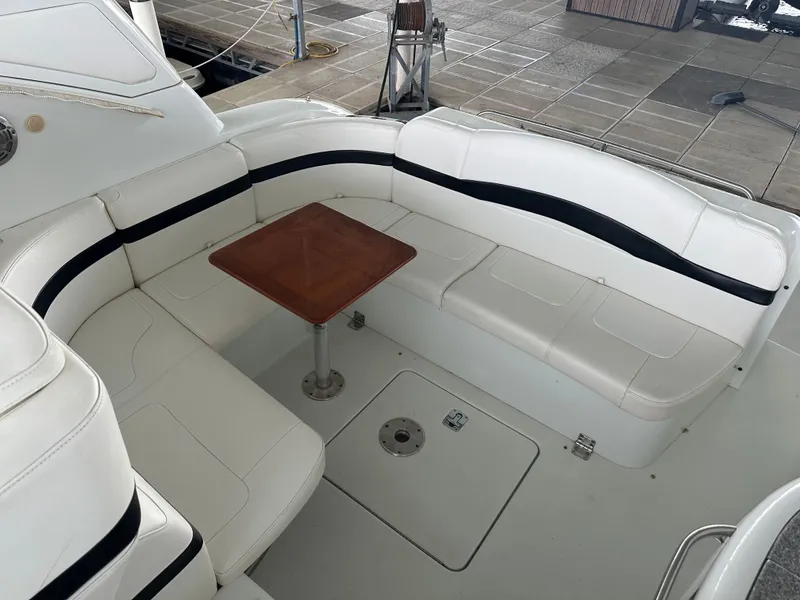 Slide: The Image of Interior of a 2008 Formula 37 Performance Cruiser with white seating area. - 13