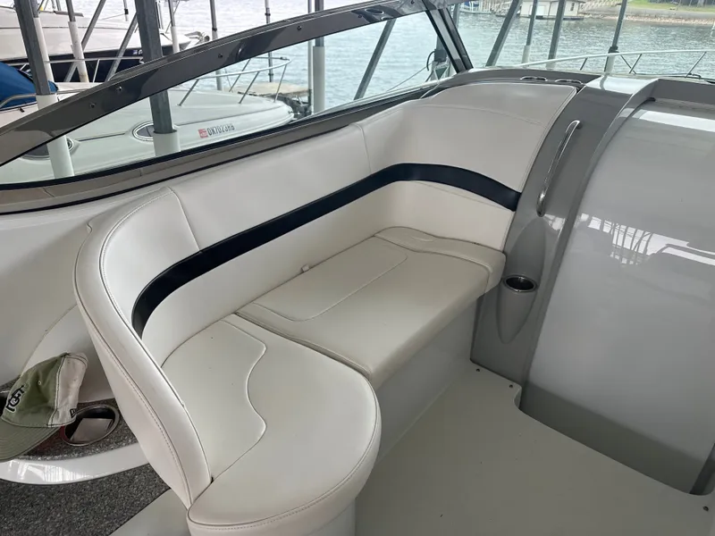 Slide: The Image of Interior of a 2008 Formula 37 Performance Cruiser with white seating. - 18
