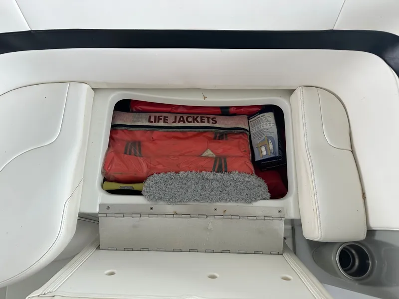 Slide: The Image of Storage compartment with life jackets on a 2008 Formula 37 Performance Cruiser. - 19