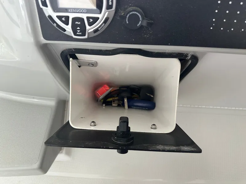 Slide: The Image of Interior of a 2008 Formula 37 Performance Cruiser with storage compartment. - 21